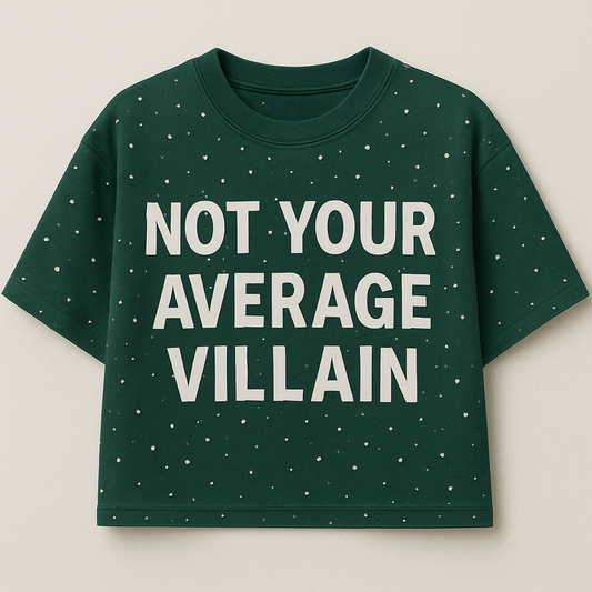 Green t-shirt with 'Not Your Average Villain' text on a beige background